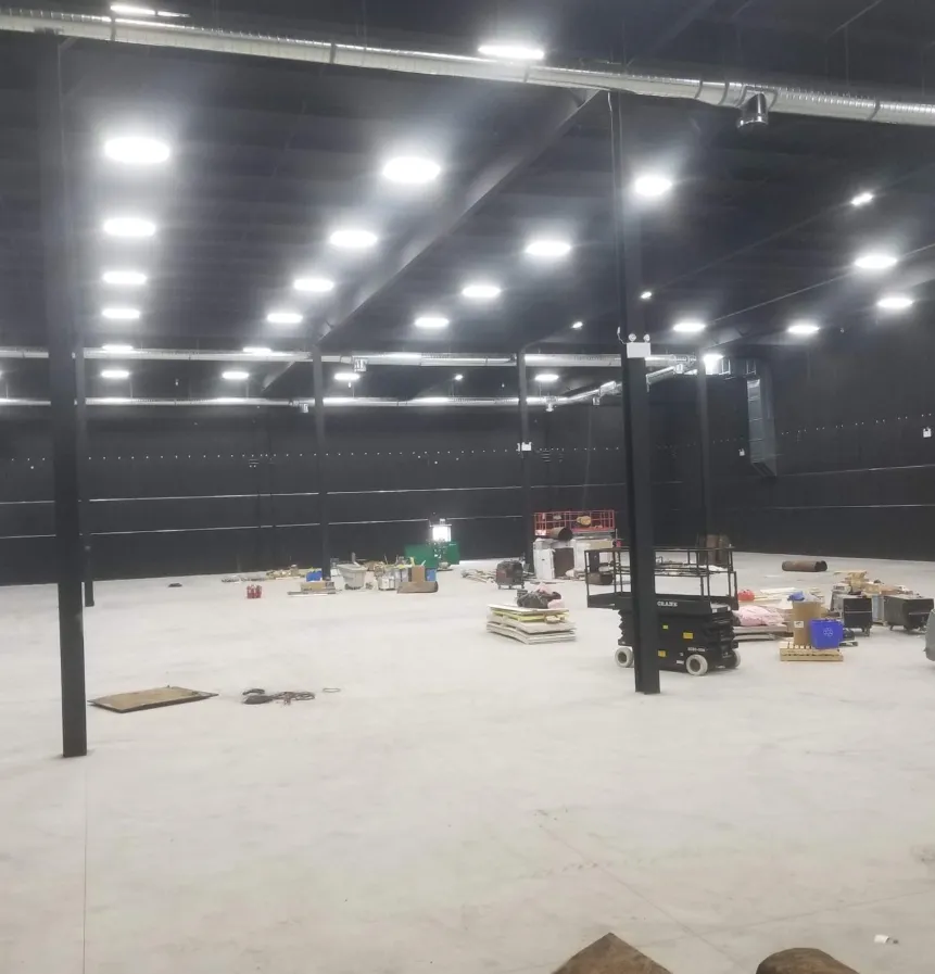 A build underway, the structure taking shape under one team