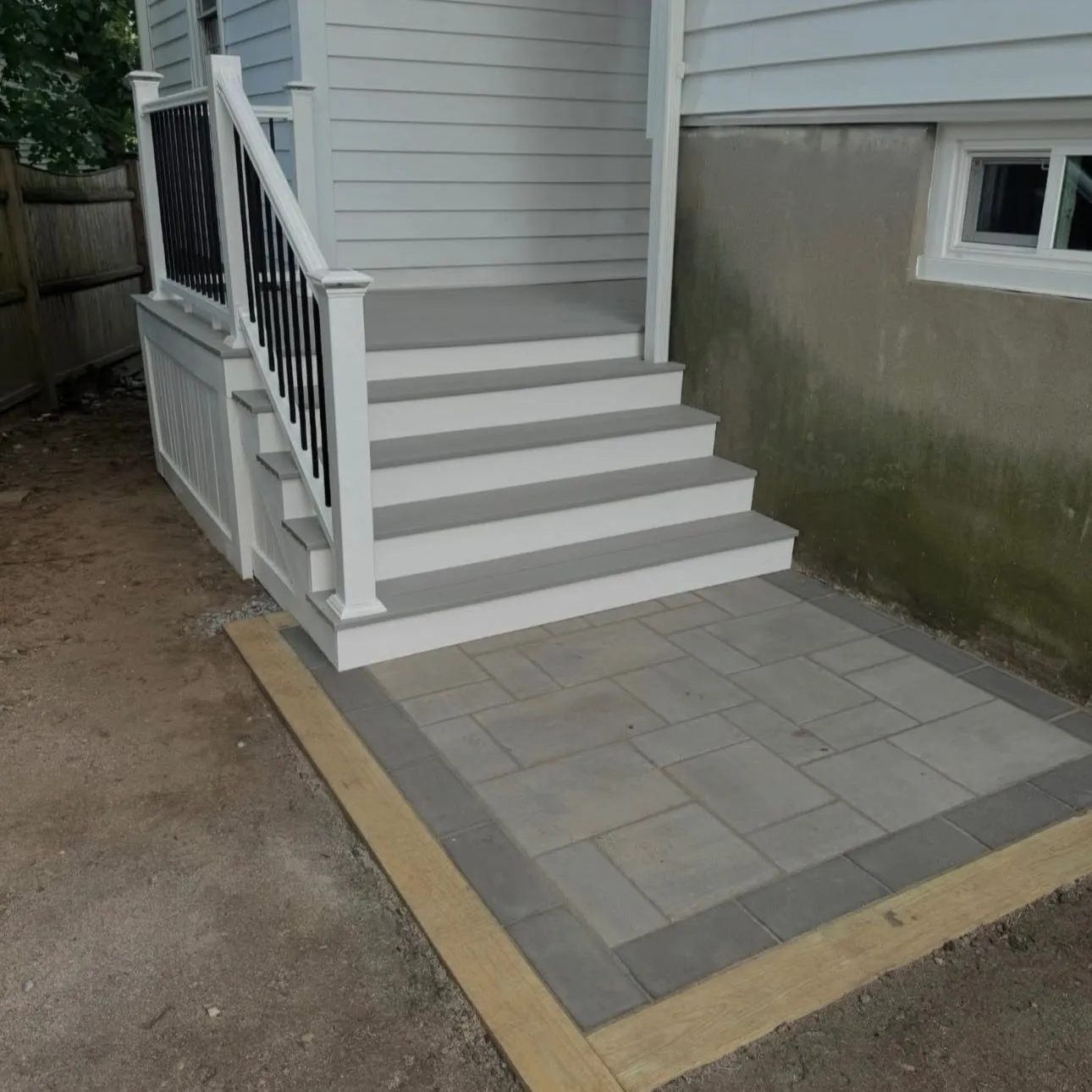 A finished backyard build by Zeybek Construction in Ontario
