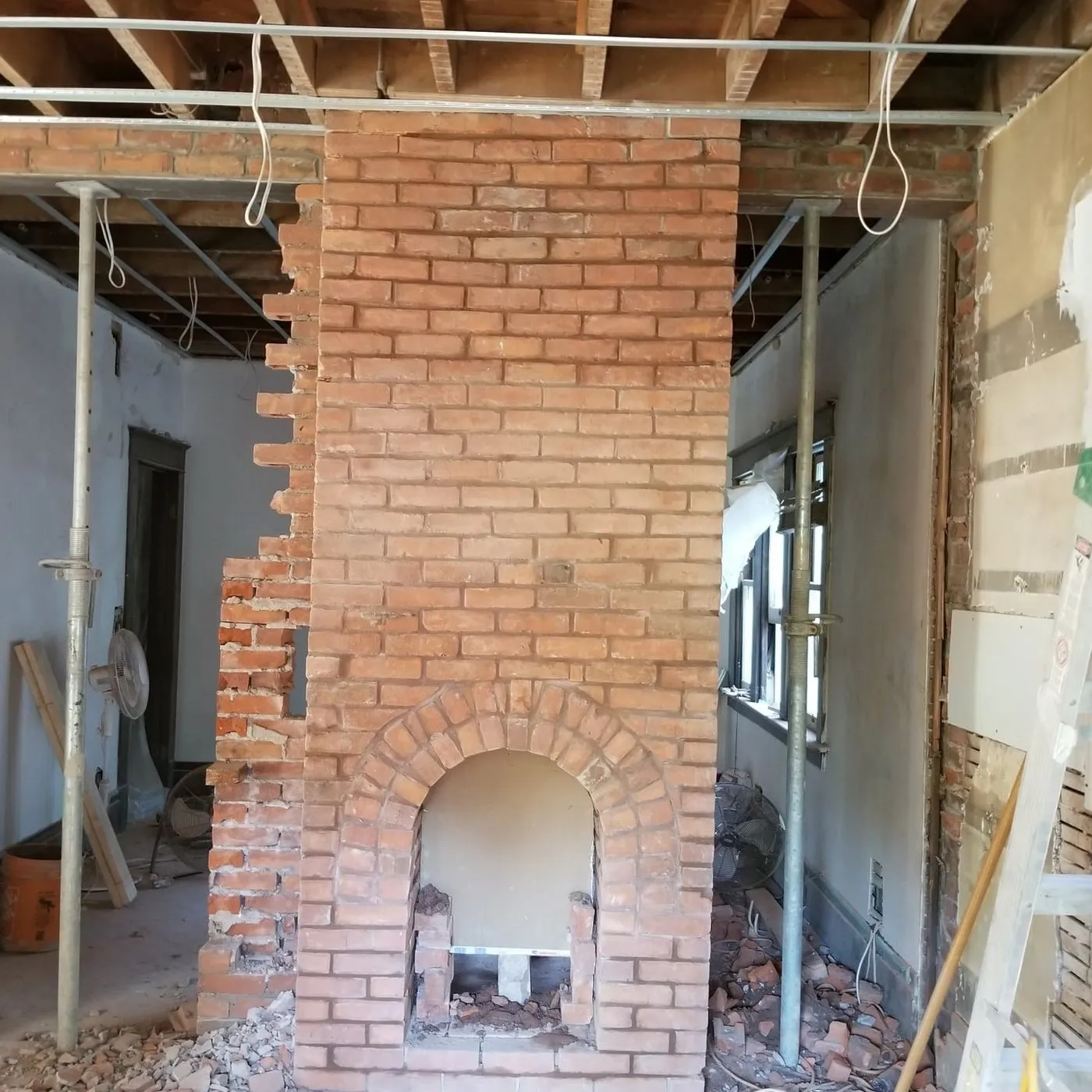 A modern fireplace feature wall built by Zeybek Construction in Ontario