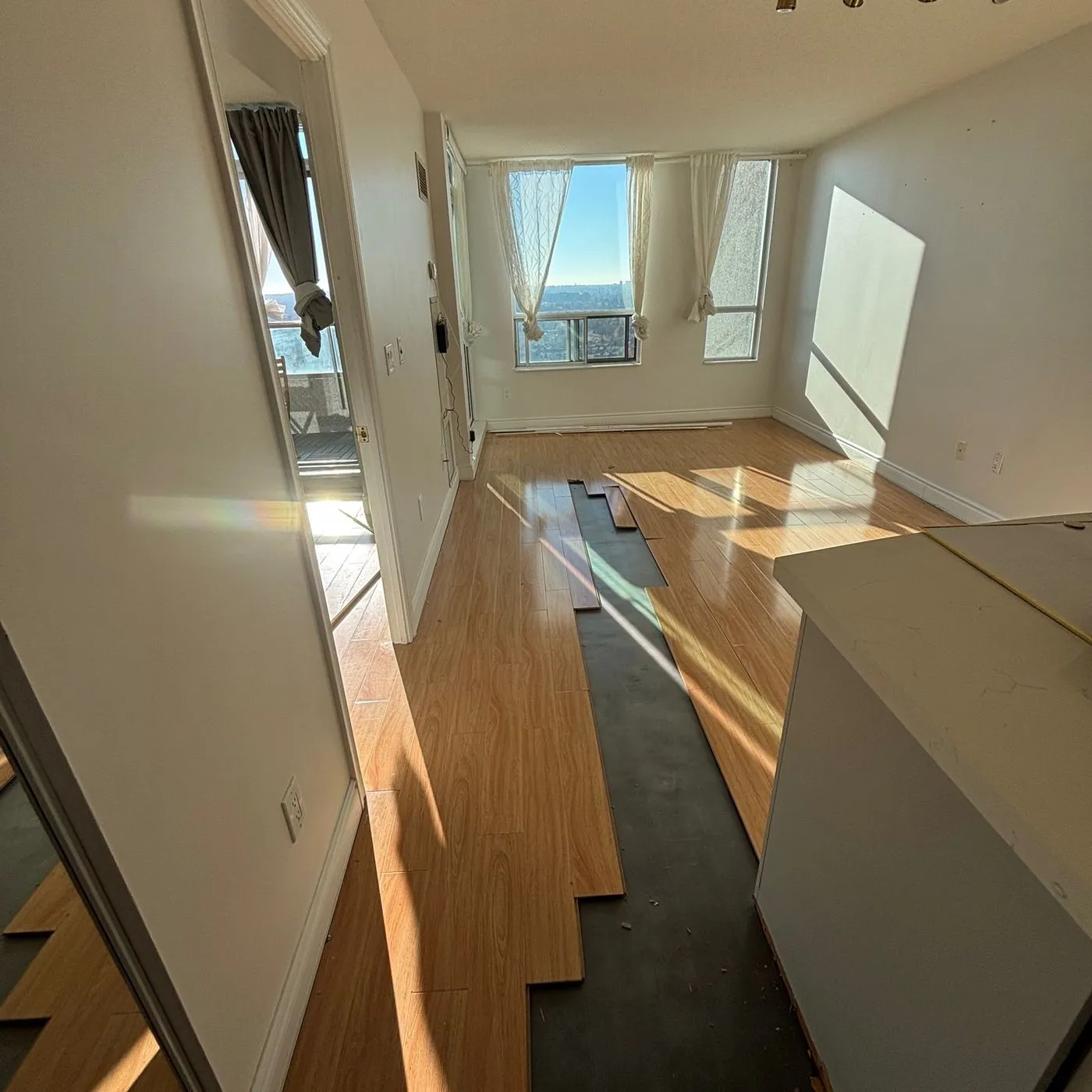 Refinished solid hardwood flooring in an Ontario home