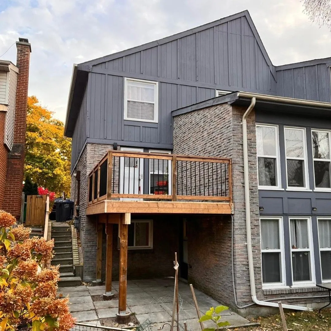 An Ontario home exterior showing the roofline, gable, and chimney